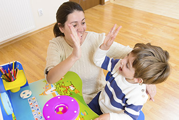Féliciter son enfant, un geste important